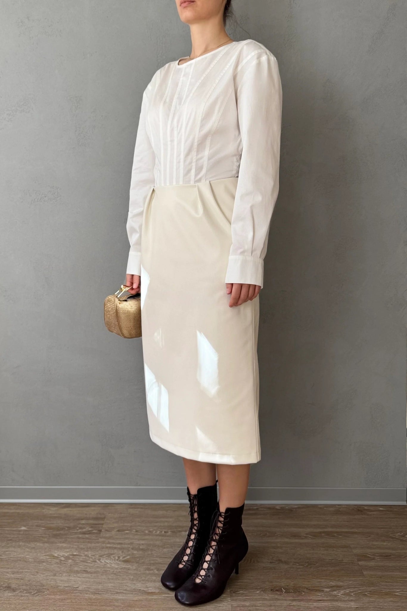 Спідниця міді з екошкіри