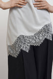 Топ з мереживом асиметричний молочний