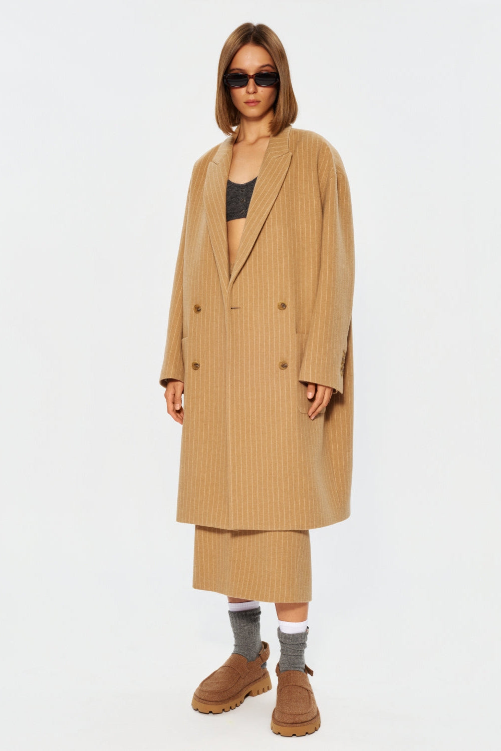 Двобортне пальто міді