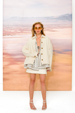 Костюм із сорочкою з бахромою та шортами-спідницею